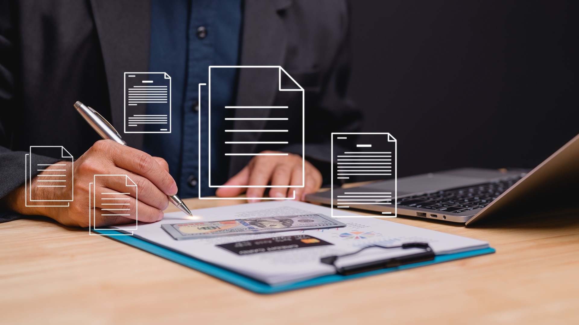 Businessman focuses on document preparation while surrounded by financial papers and laptop scene reflects professionalism, diligence, and importance of organized documentation in business